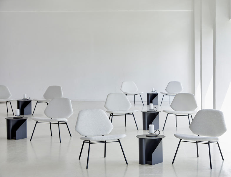 Sentrum Side Table by Woud, showing sentrum side tables in live shot.