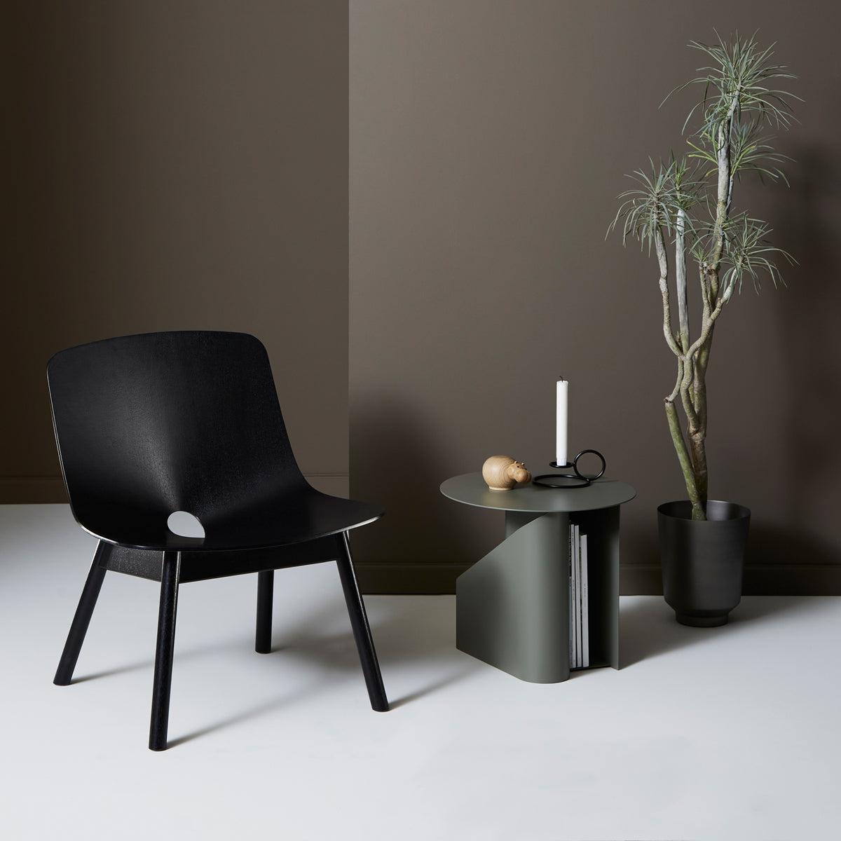 Sentrum Side Table by Woud, showing sentrum side table in live shot.