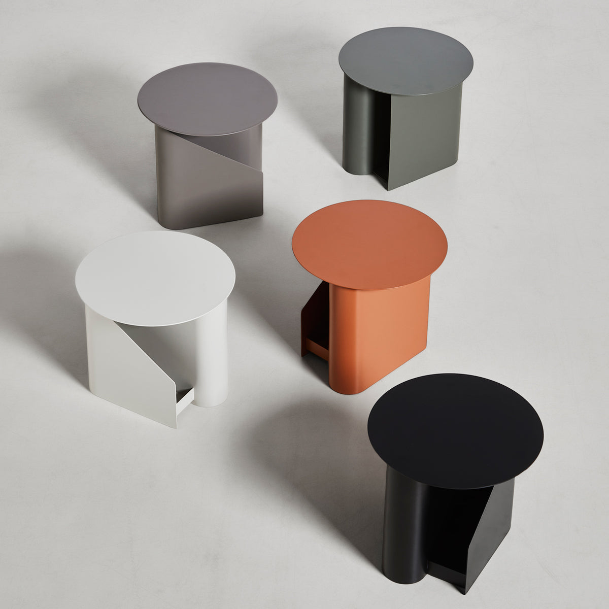 Sentrum Side Table by Woud, showing sentrum side tables in live shot.