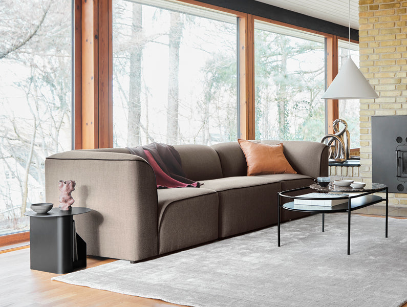 Sentrum Side Table by Woud, showing sentrum side table in live shot.