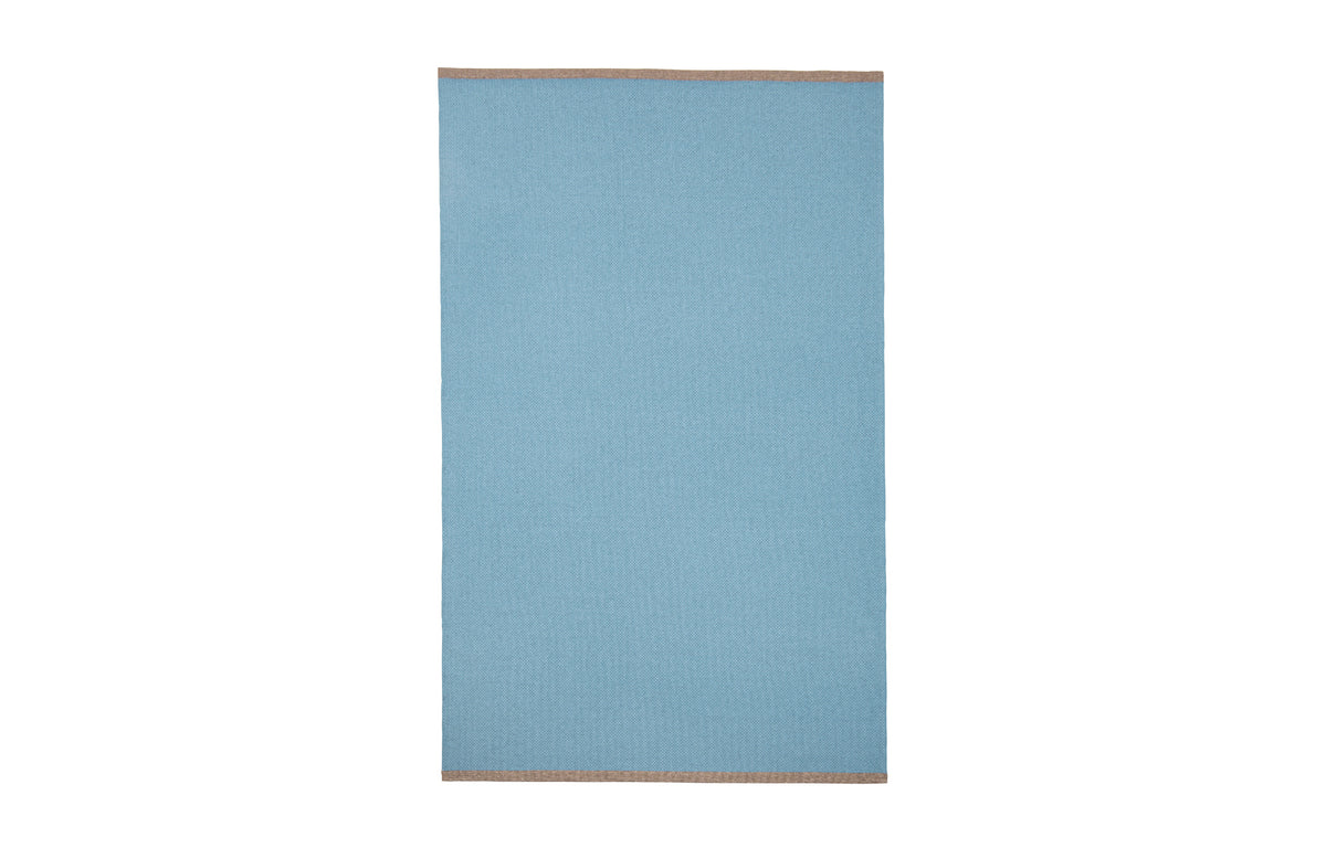 Shade Woven Plastic Rug by Brita - Blue Shade Woven Rug.