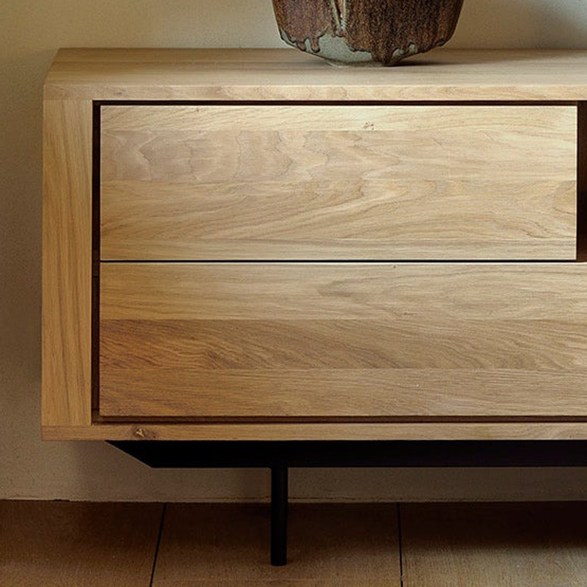 Shadow TV Cupboard by Ethnicraft, showing closeup view of shadow oak tv cupboard in live shot.