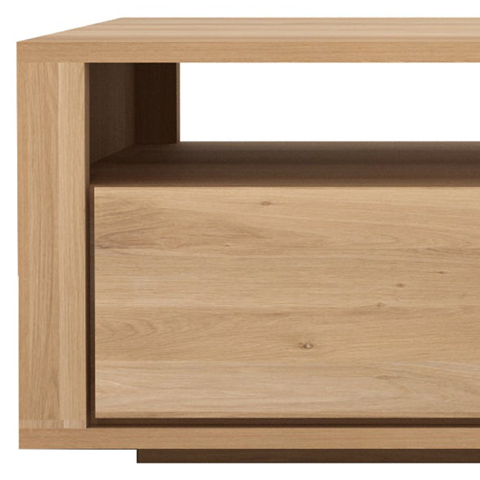 Shadow TV Cupboard by Ethnicraft, showing closeup view of shadow oak tv cupboard in oak/2 drawers.