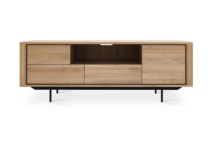 Shadow TV Cupboard by Ethnicraft, showing front view of shadow oak tv cupboard in oak/2 drawers 1 door-1 flip-down door.