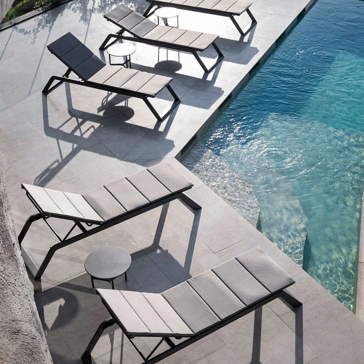 Siesta Sunbed by Cane-Line, showing siesta sunbeds in live shot.