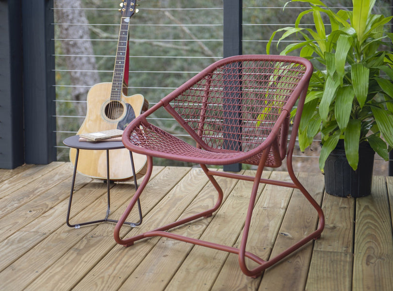 Sixties Armchair by Fermob, showing angle view of the armchair in the live shot.