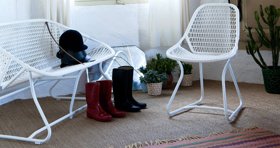 Sixties Bench by Fermob, showing live shoot of the bench with chair.