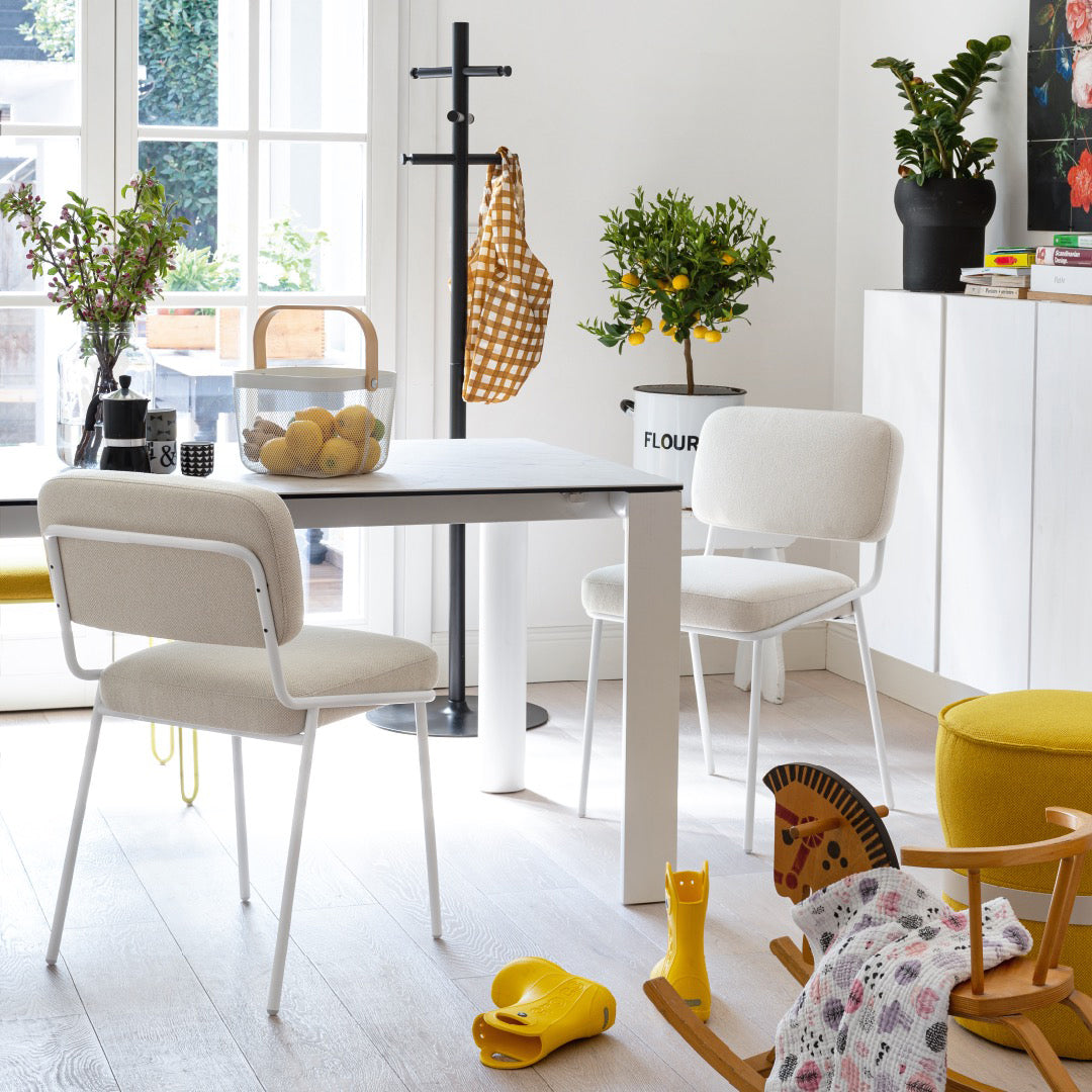 Sixty Chair by Connubia, showing sixty chairs with table in live shot.
