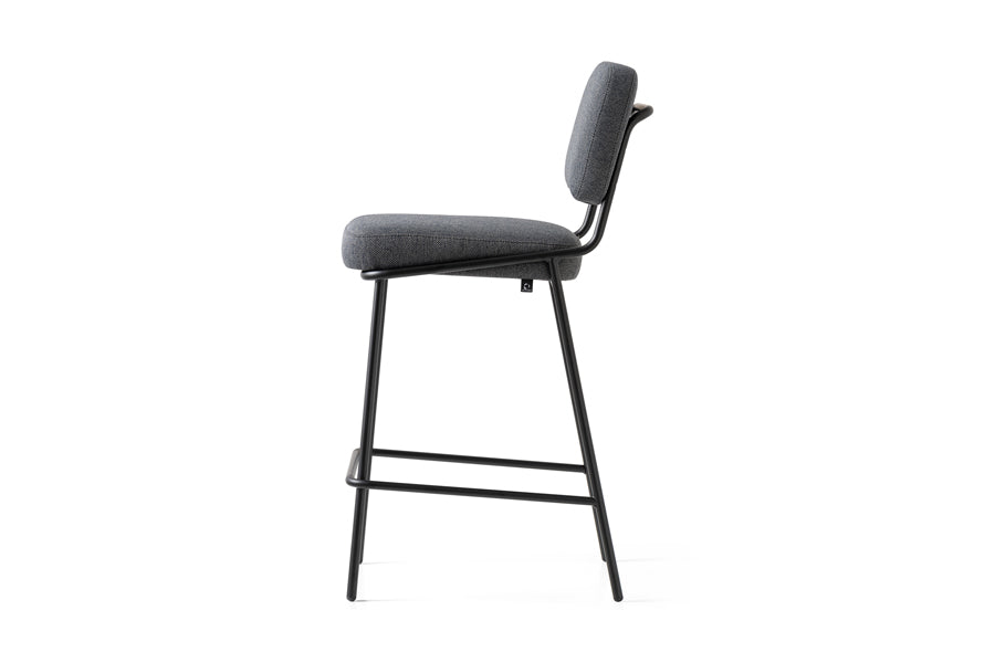 Sixty Counter Stool by Connubia, showing side view of sixty counter stool in matt black metal frame/black cros upholstery.