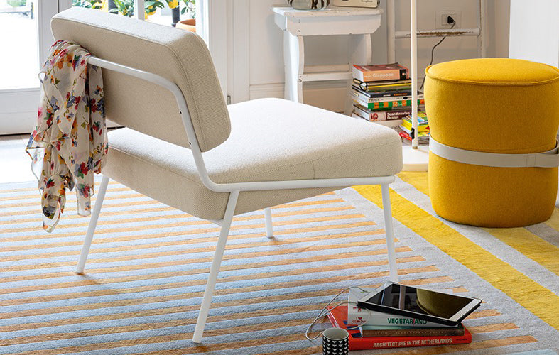 Sixty Lounge Chair by Connubia, showing sixty lounge chair in live shot.