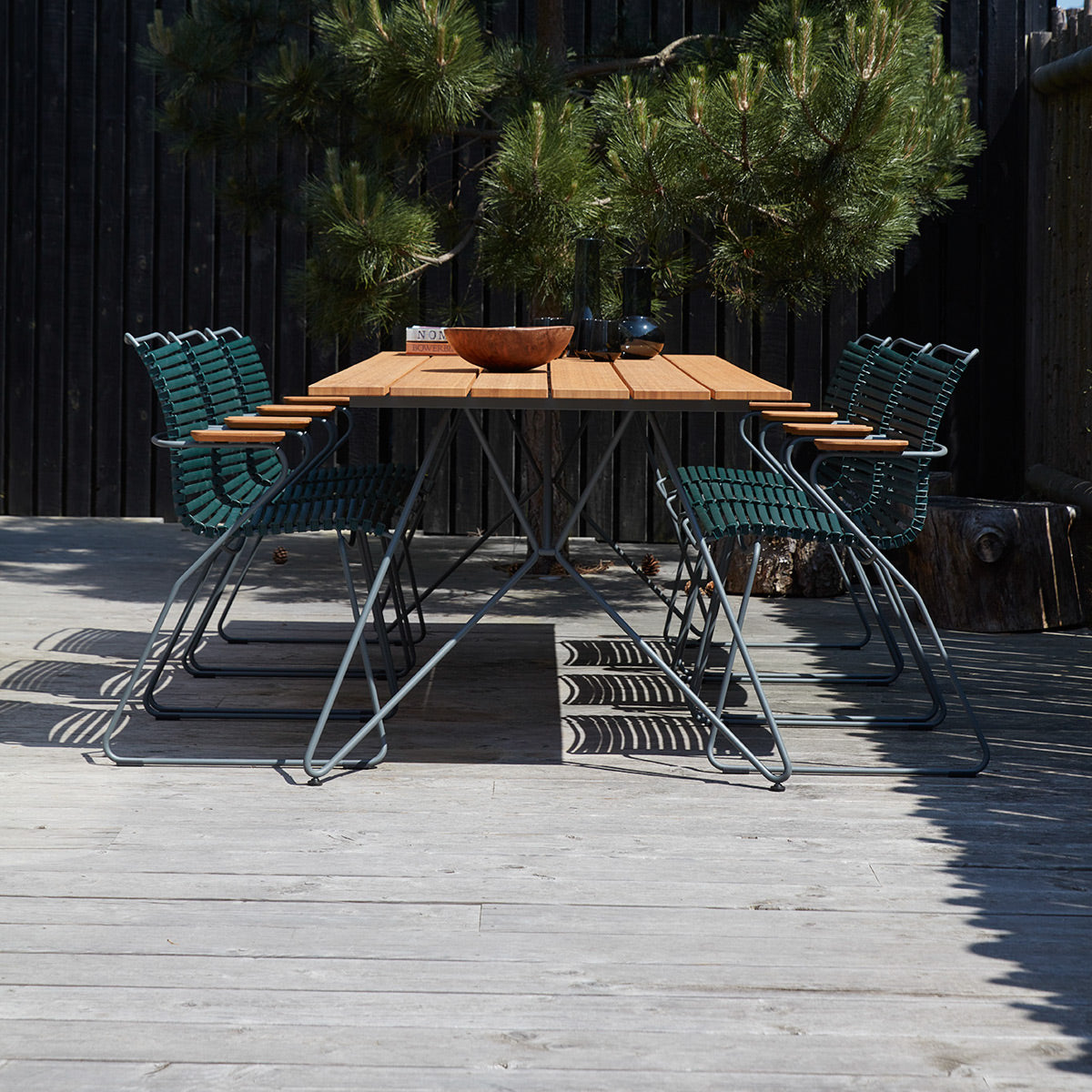 Sketch Outdoor Dining Table by Houe, showing sketch outdoor dining table with chairs in live shot.