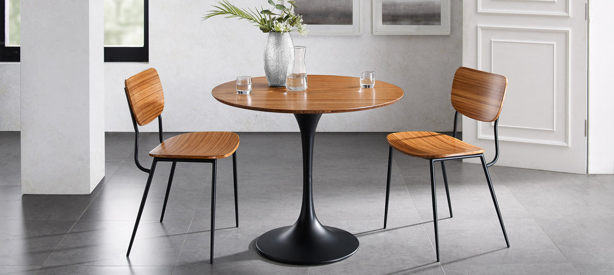 Soho Amber Dining Chair by Greenington, showing amber dining chairs with dining table in live shot.