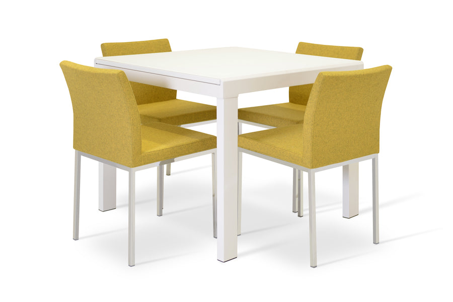 Aria Metal Dining Chair by SohoConcept, Showing four dining chairs in camira blazer amber wool with chrome base and nigara extendable dining table with white powder.