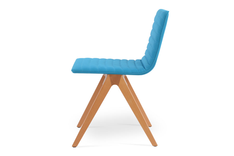 Corona Fino Full Upholstery Dining Chair by SohoConcept, showing side view in camira era turquoise fabric with natural finish.