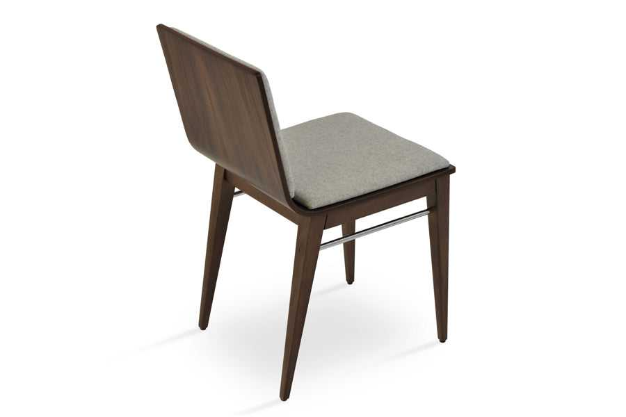 Corona Wood Dining Chair by SohoConcept, showing angle view in camira blazer silver wool with american walnut veneer base.