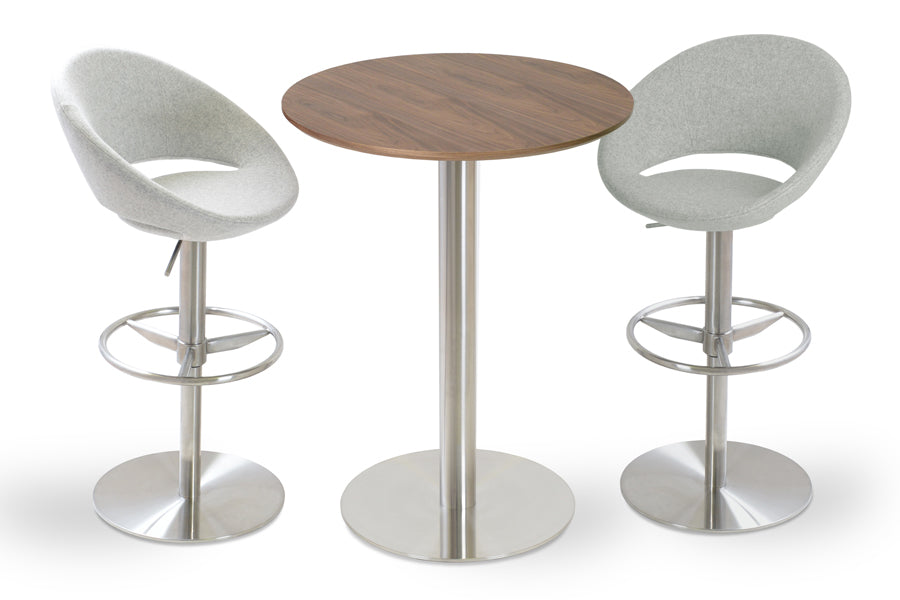 Crescent Piston Stool by SohoConcept, showing angle view of two chairs in camira blazer silver wool with polished stainless steel base and tango bar table.