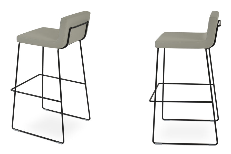 Dallas Wire Handle Back Stool by SohoConcept, showing angle view in light grey leatherette with black base.