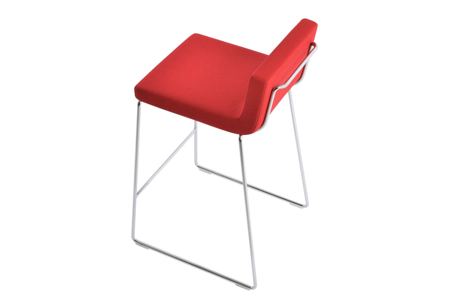 Dallas Wire Handle Back Stool by SohoConcept, showing angle view in camira era red fabric with chrome base.