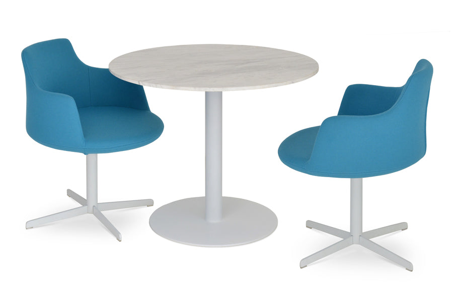 Dervish 4 Star Swivel Chair by SohoConcept, showing two chairs and tango dining table in camira blazer turquoise wool and white powder base respectively.