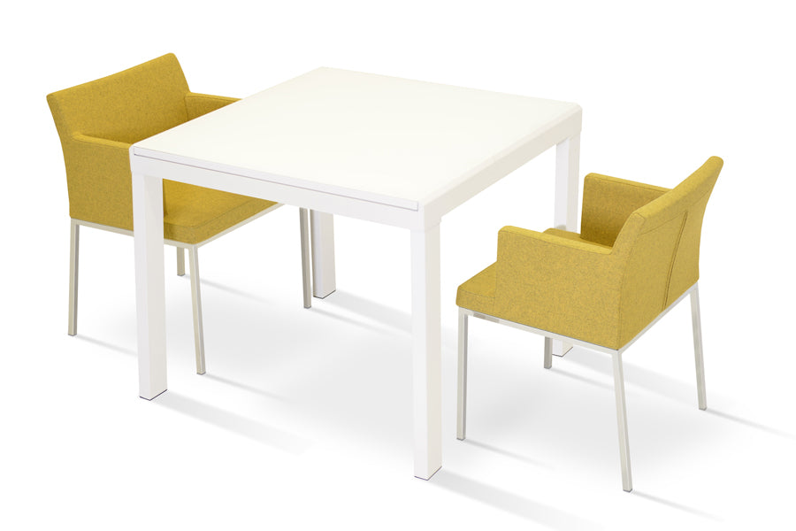 Soho Metal Arm Chair by SohoConcept, showing metal arm chairs with table.