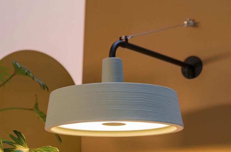 Soho Outdoor A Wall Light with LED by Marset, showing soho outdoor a wall light with led in live shot.
