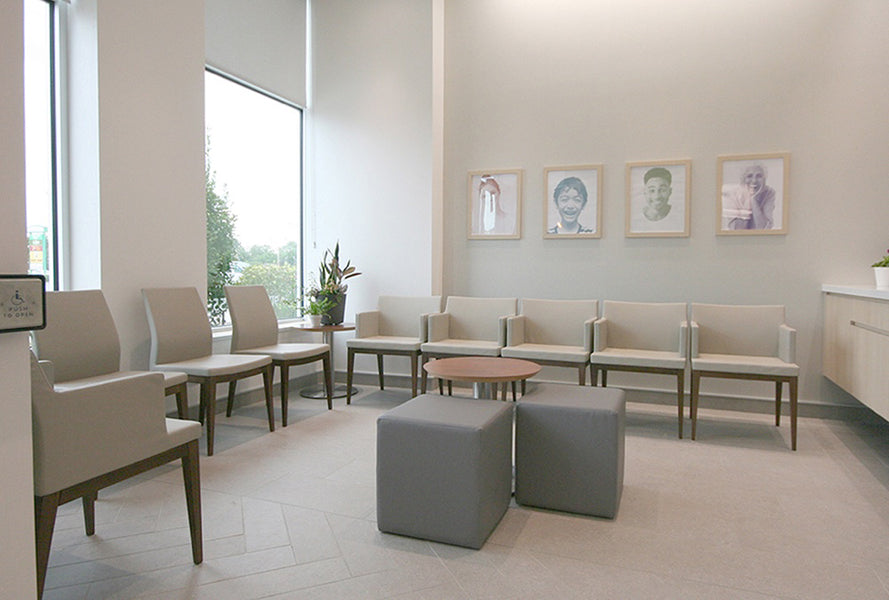 Soho Wood Arm Chair by SohoConcept, showing wood arm chairs with table in live shot.