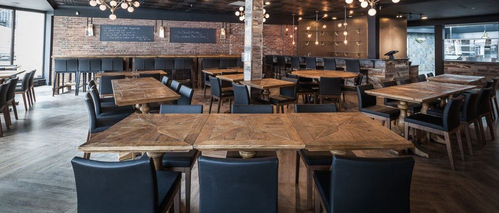 Soho Wood Arm Chair by SohoConcept, showing wood arm chairs with table in live shot.