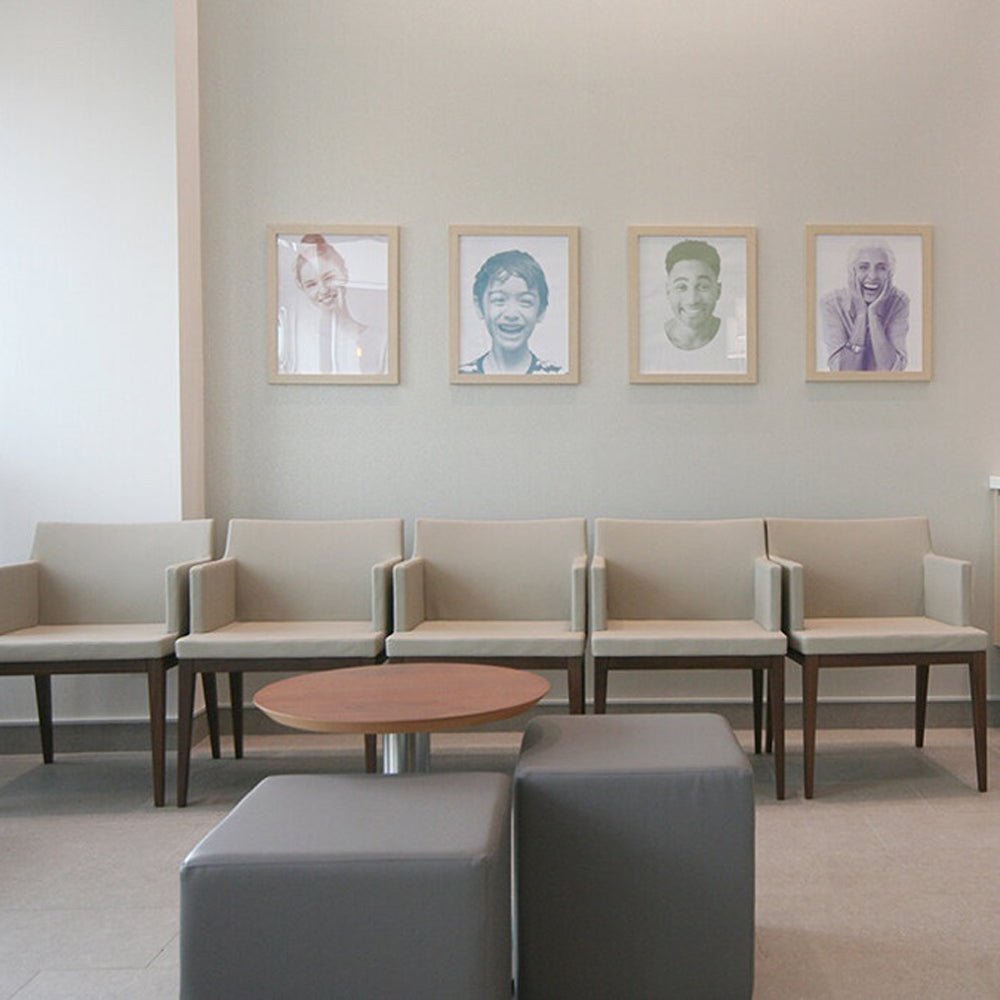 Soho Wood Arm Chair by SohoConcept, showing front view of wood arm chairs in live shot.