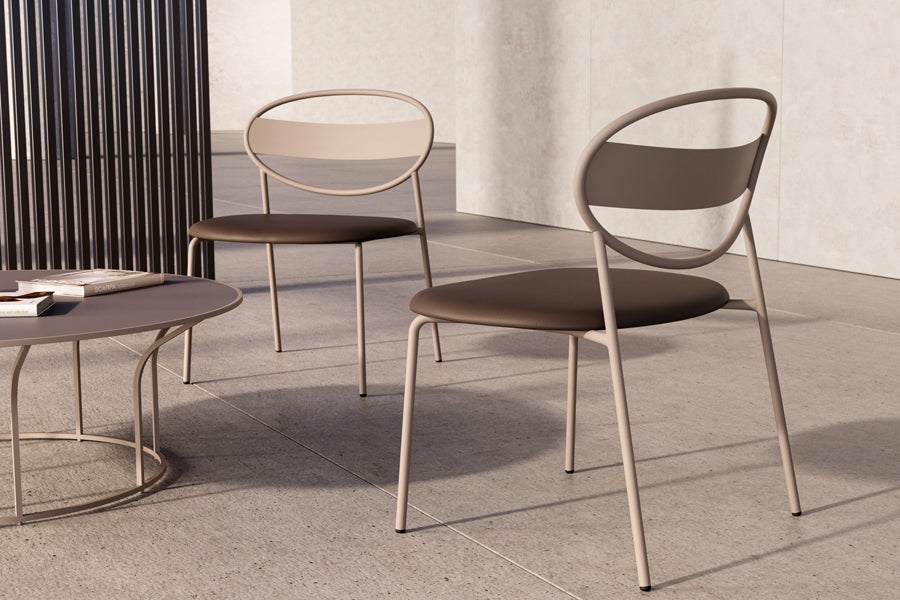 Sole Lounge Chair by B&T, showing sole lounge chairs in live shot.