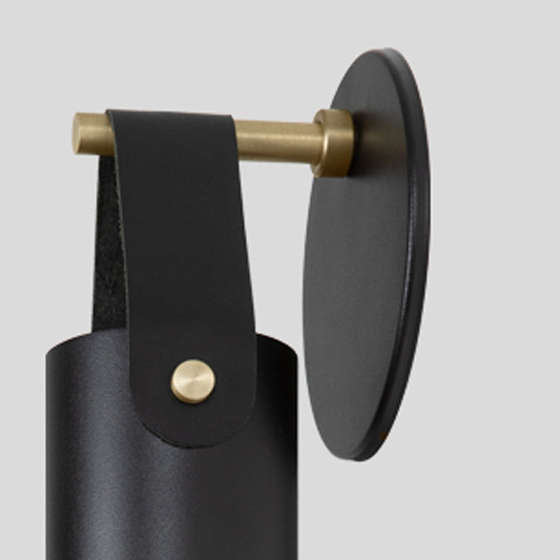 Spero Sconce by Cerno, showing closeup view of spero sconce in black/black leather.