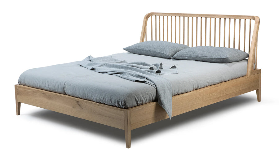 Spindle Bed with Slats by Ethnicraft, showing angle view of bed with slats.