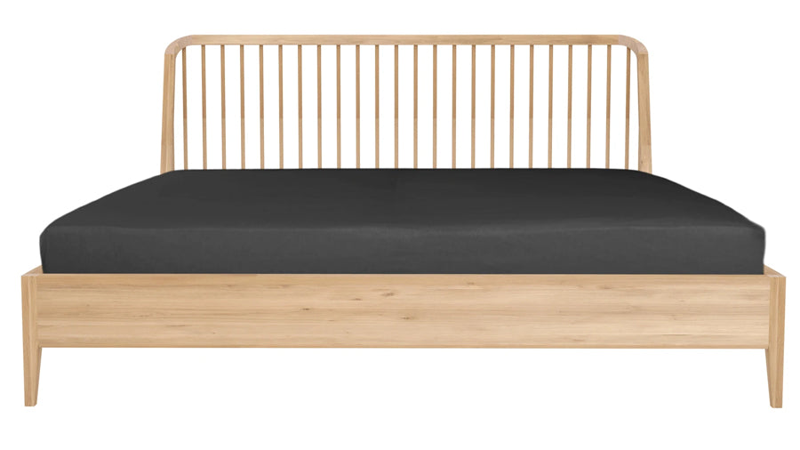 Spindle Bed with Slats by Ethnicraft, showing front view of bed with slats.