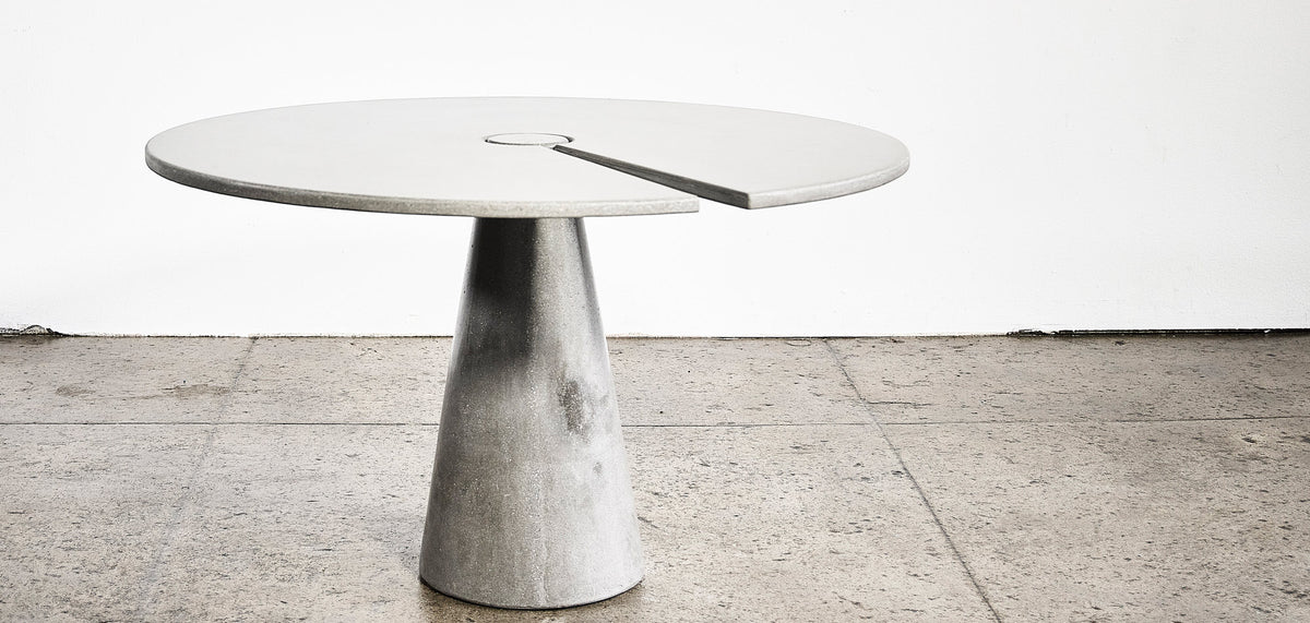 James De Wulf Split Locking Round Dining Table by De Wulf, showing split locking round dining table in live shot.