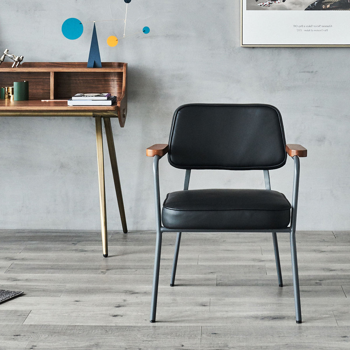 Prouve Arm Dining Chair by SohoConcept, showing prouve arm dining chair in live shot.