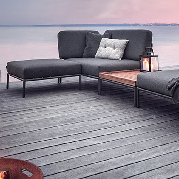 Level Coffee Table by Houe, showing level coffee table with sofa in live shot.