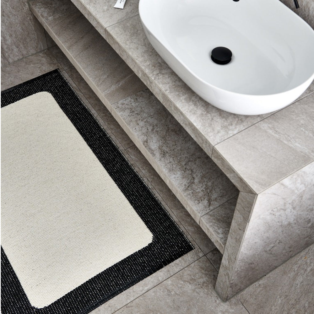 Ilda Black & Vanilla Runner Rug by Pappelina, showing ilda black & vanilla runner rug in live shot.