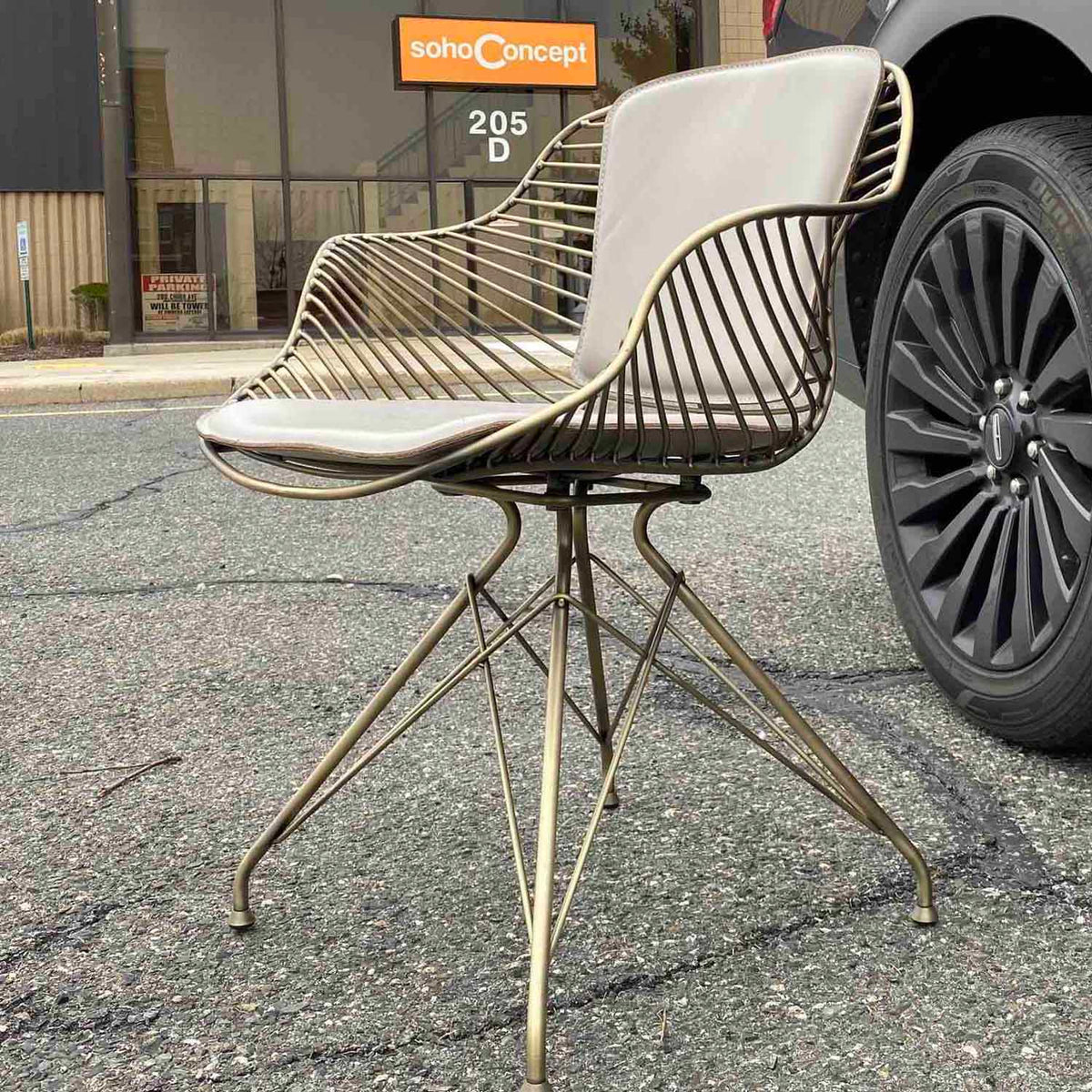 Zebra Armchair by SohoConcept, showing zebra armchair in live shot.