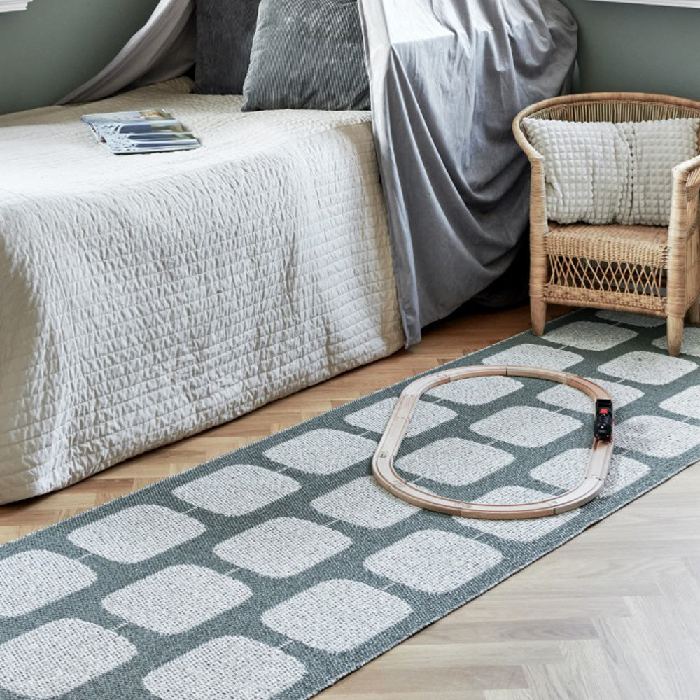 Sten Army & Fossil Grey Runner Rug by Pappelina, showing sten army & fossil grey runner rug in live shot.