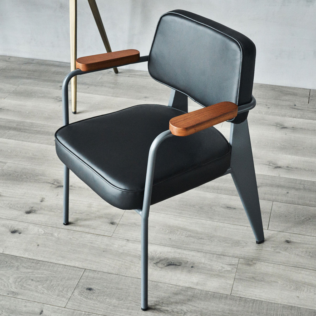 Prouve Arm Dining Chair by SohoConcept, showing prouve arm dining chair in live shot.