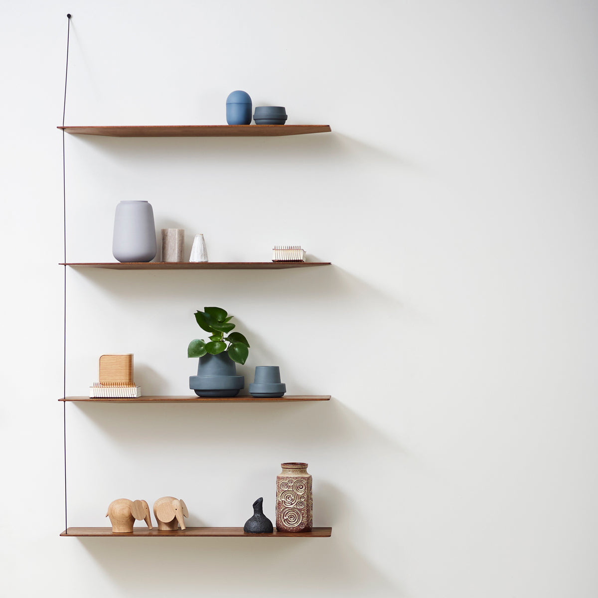 Stedge Shelf by Woud, showing stedge shelf in live shot.