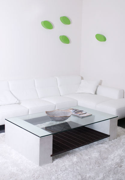James De Wulf Steel Grating Coffee Table by De Wulf, showing steel grating coffee table with sectional sofa in live shot.