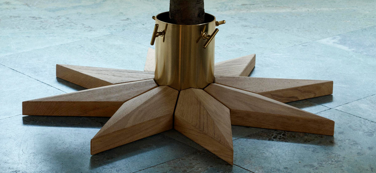 Stella Christmas Tree Base by Skagerak, showing stella christmas tree base in live shot.