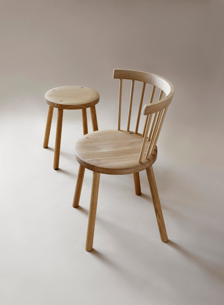 Storia KVT10 Chair by Nikari, showing storia kvt10 chair with stool in live shot.