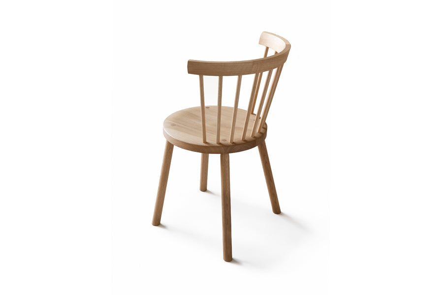 Storia KVT10 Chair by Nikari, showing back view of storia kvt10 chair in lacquer ash.