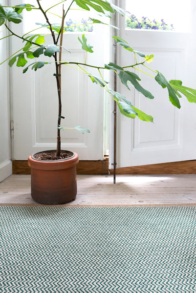 Strand Woven Plastic Rug by Brita, showing strand woven plastic rug in live shot.