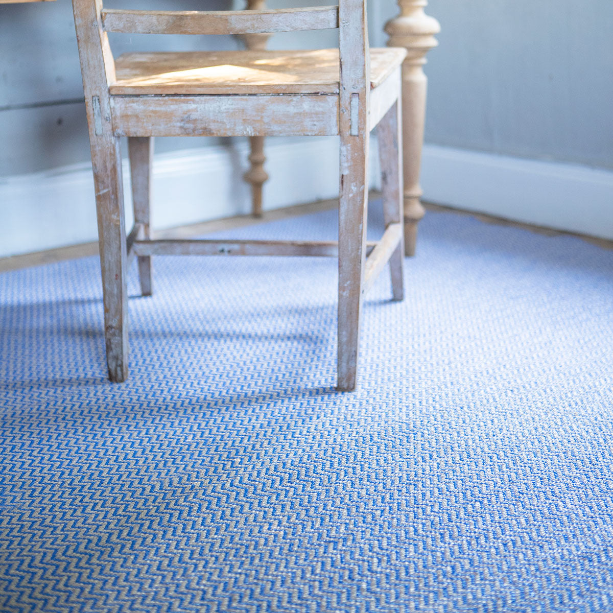 Strand Woven Plastic Rug by Brita, showing closeup view of strand woven plastic rug in live shot.