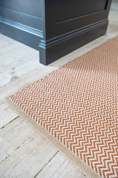Strand Woven Plastic Rug by Brita, showing strand woven plastic rug in live shot.