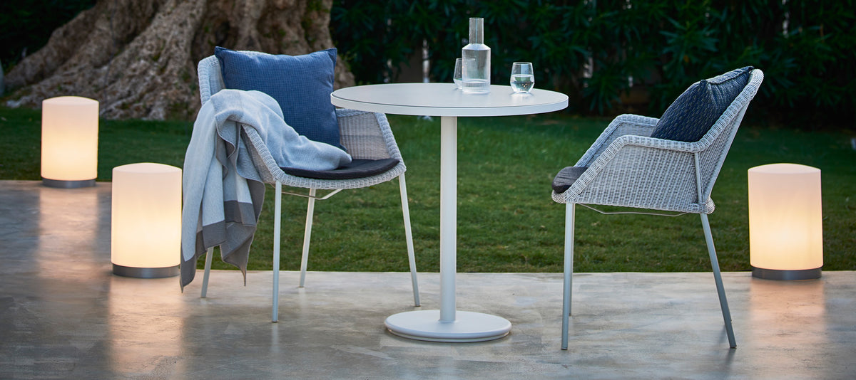 Stripe Scatter Cushion by Cane-Line, showing stripe scatter cushion in live shot.
