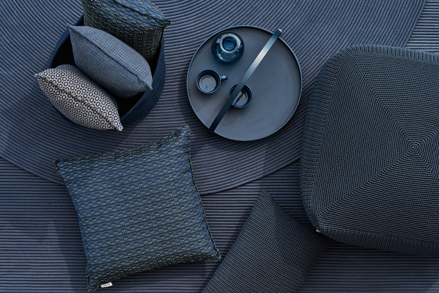 Stripe Scatter Cushion by Cane-Line, showing stripe scatter cushions in live shot.