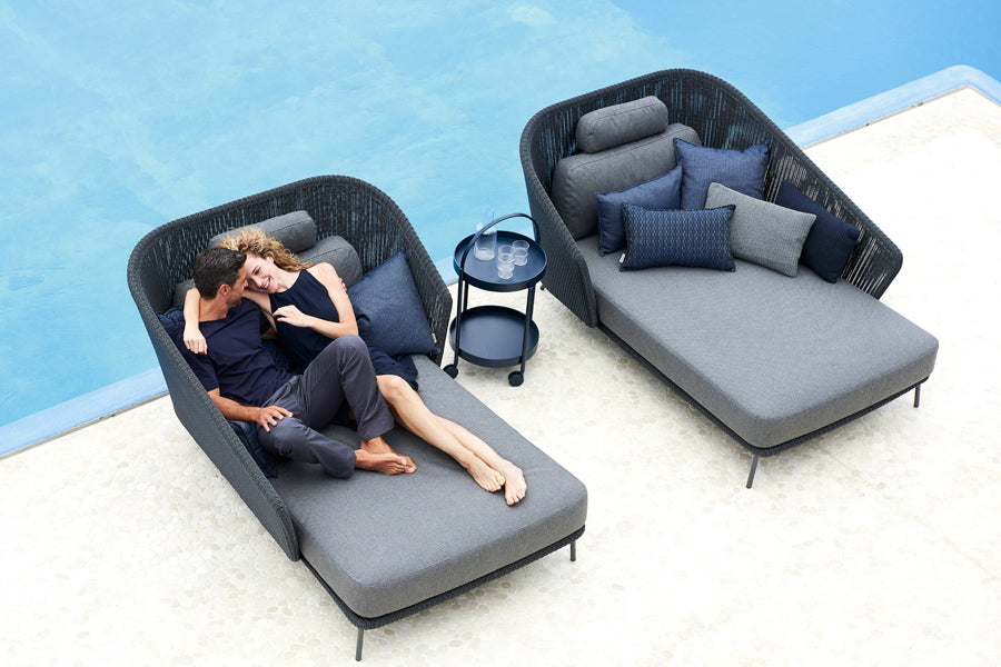 Stripe Scatter Cushion by Cane-Line, showing stripe scatter cushion in live shot.